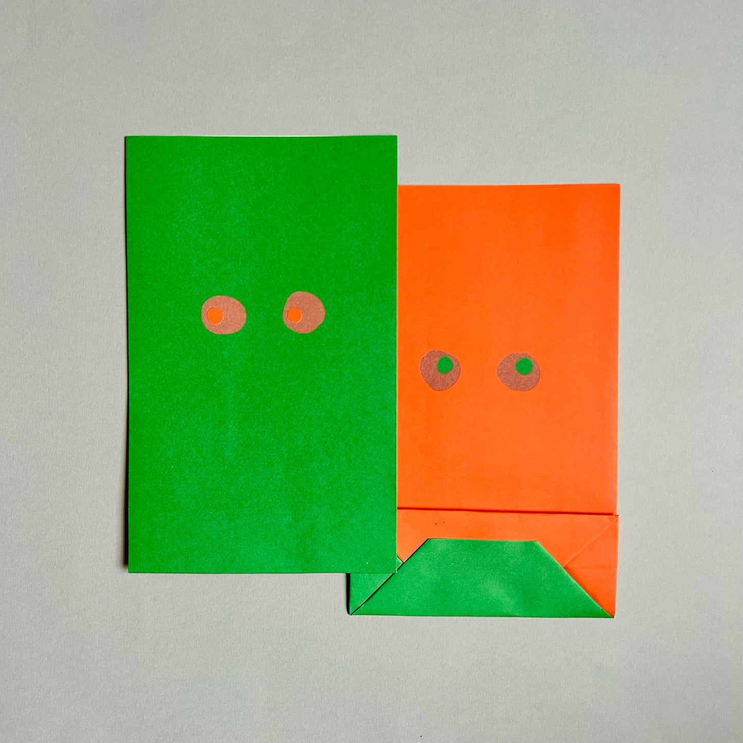 Blockbottombag - Eyes, grün/orange