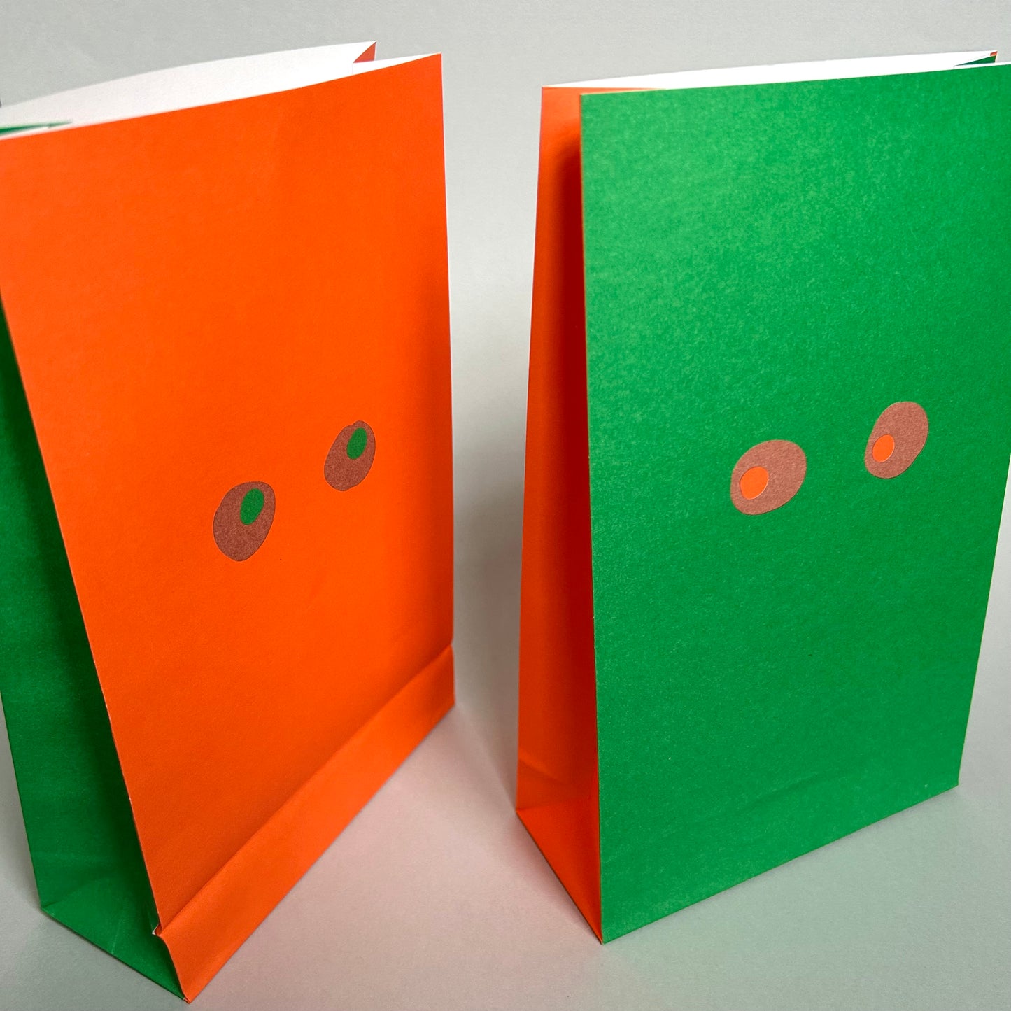 Blockbottombag - Eyes, grün/orange