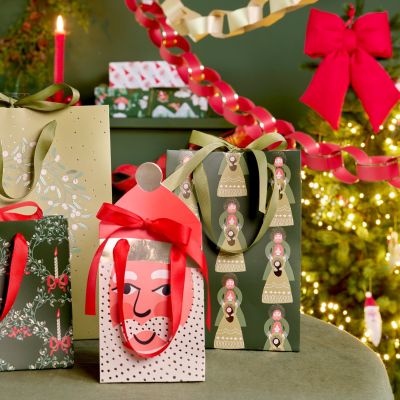 Geschenktüte mit Weihnachtsmann-Motiv